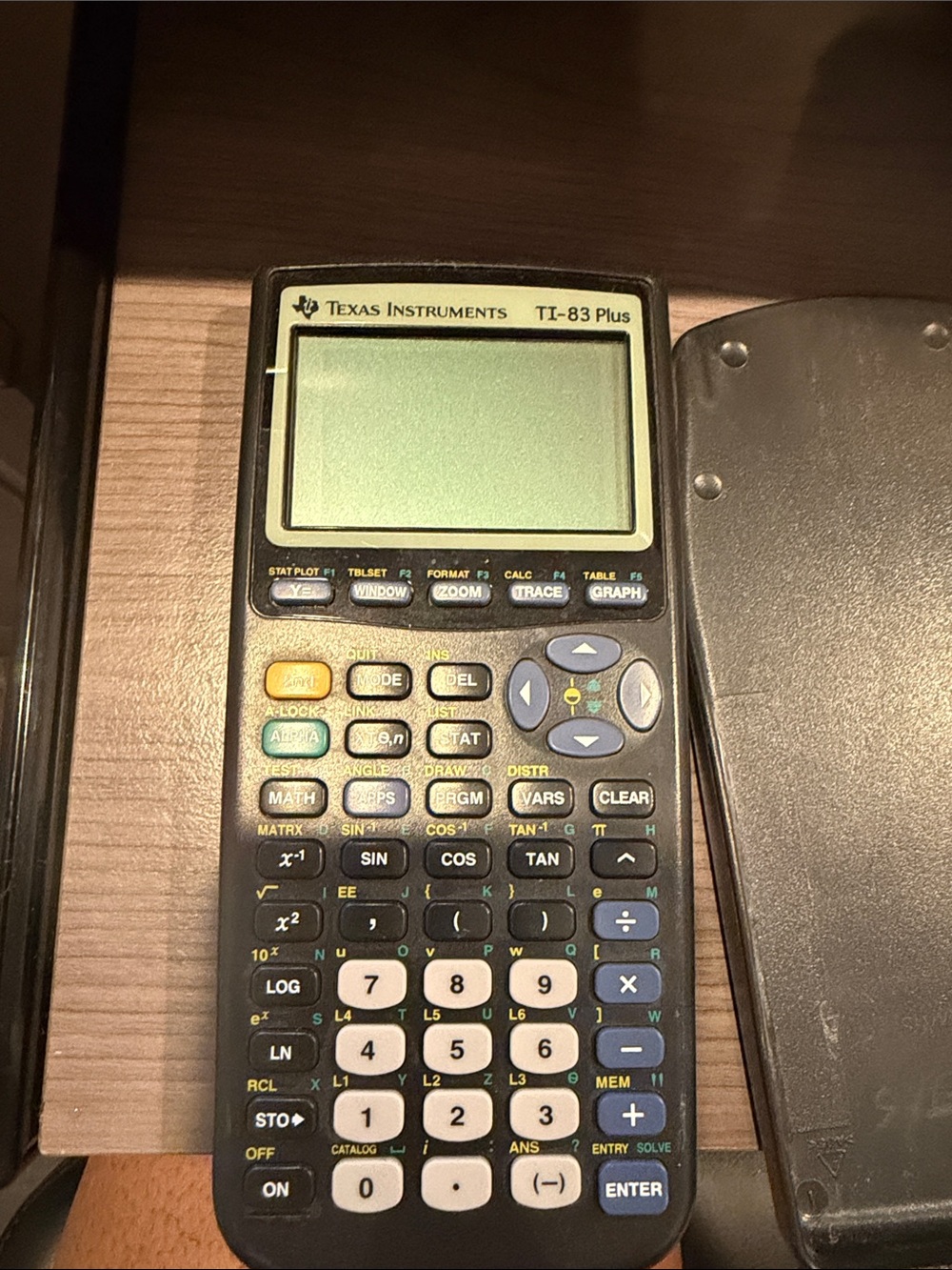 Texas Instruments TI-83 Plus Graphing Calculator - Black with White Keys
